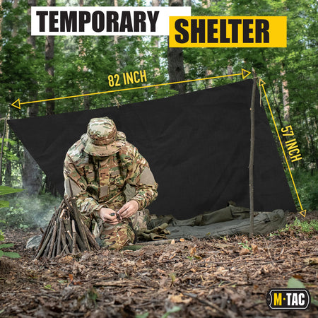 Black M-Tac Waterproof Poncho Used As Shelter